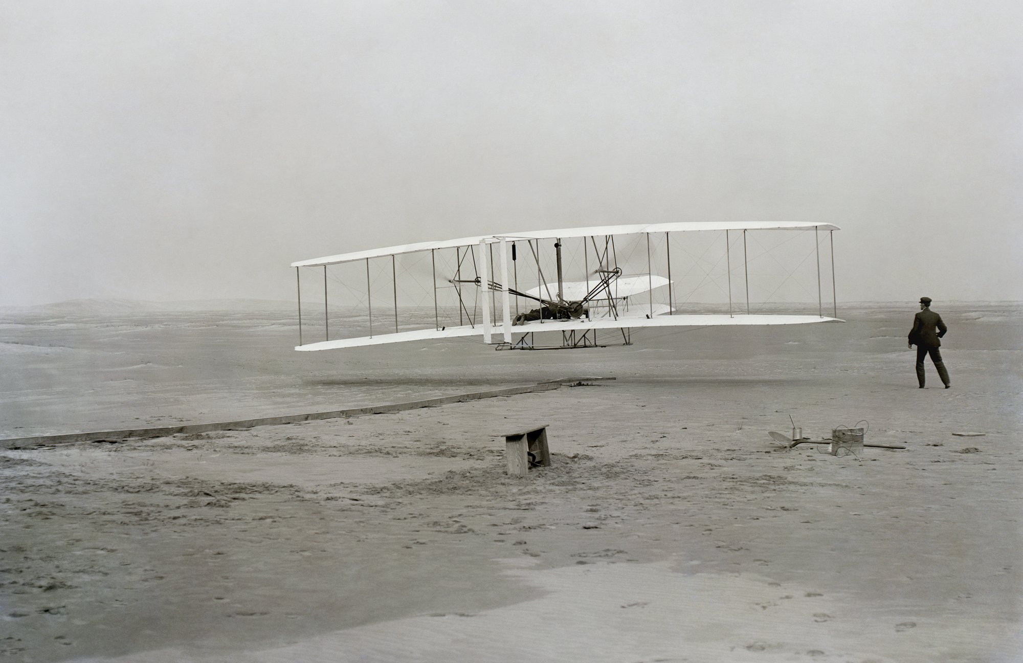 First airplane flight, taking off from rail, near Kitty Hawk, North Carolina, on December 17, 1903