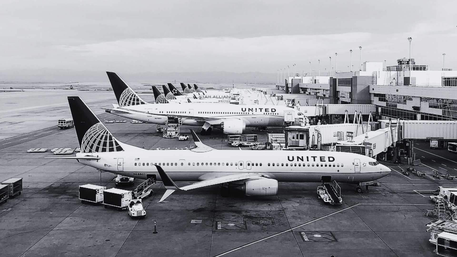 A noir image of multiple aircrafts to emphasize the tragedy of the loss of human life