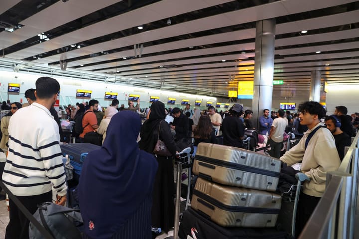Passengers queue at Heathrow as a cyber-attack disrupts check-in and boarding systems across Europe.