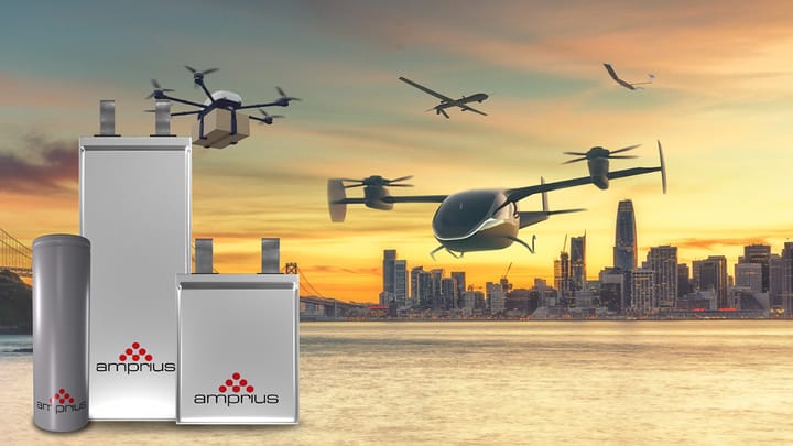 Amprius Technologies announcement showcasing SiCore battery cells with drones flying over a city skyline at sunset
